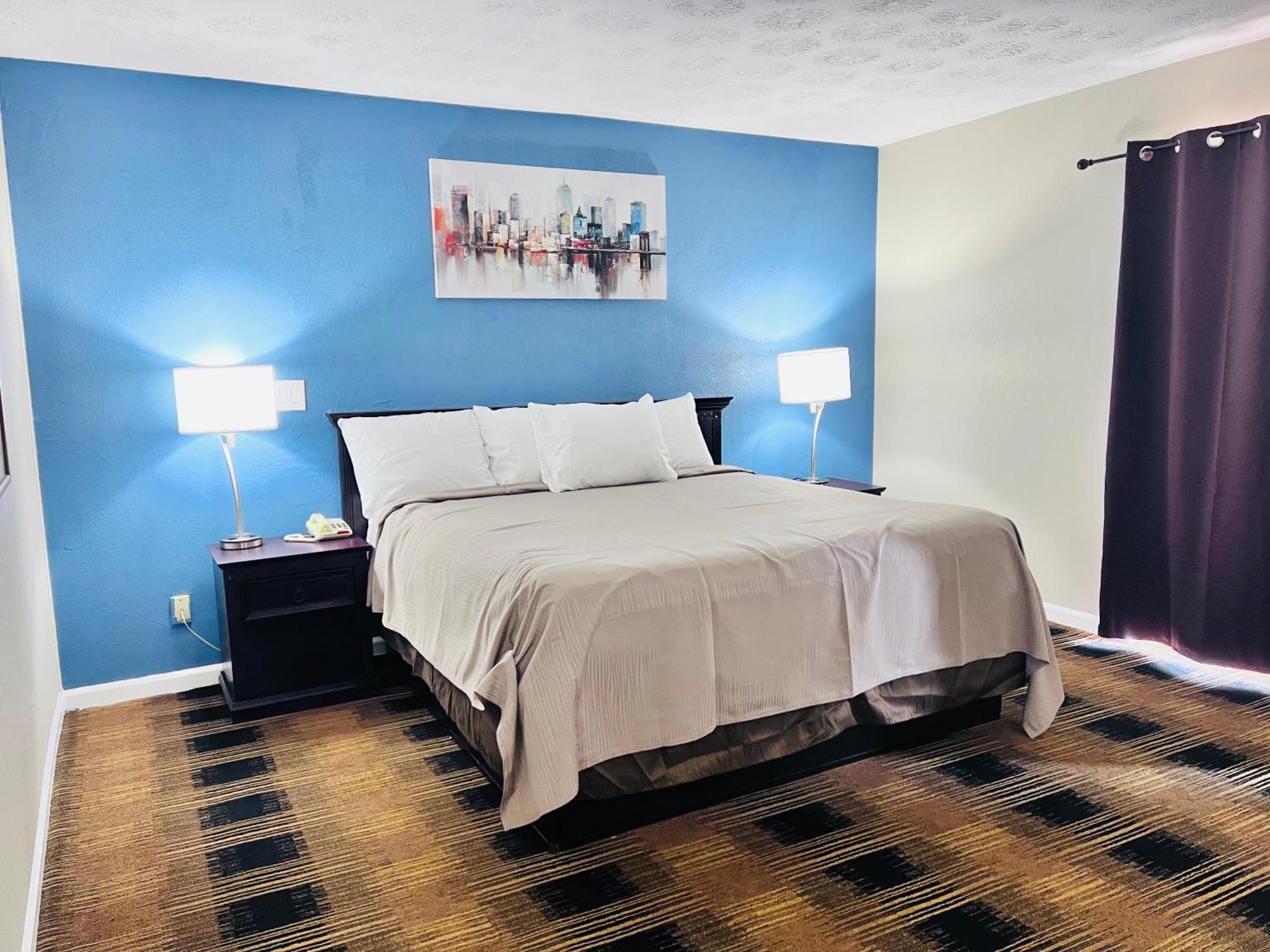 Budgetel Inn & Suites Диллард Экстерьер фото